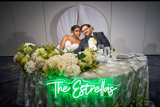 Together Forever: The Bride and Groom Enjoying Their Sweetheart Table